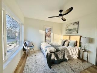 619 N Homan Ave, Chicago, IL 60624 - bedroom with wood finished floors and a ceiling fan