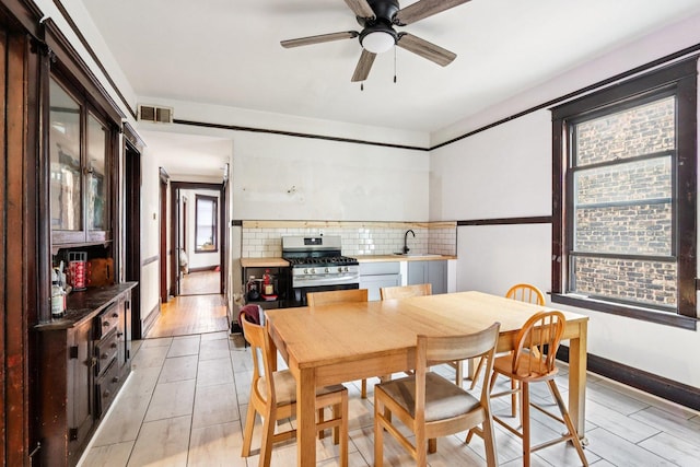 8548 S Manistee Ave, Chicago, IL 60617 - dining room with ceiling fan