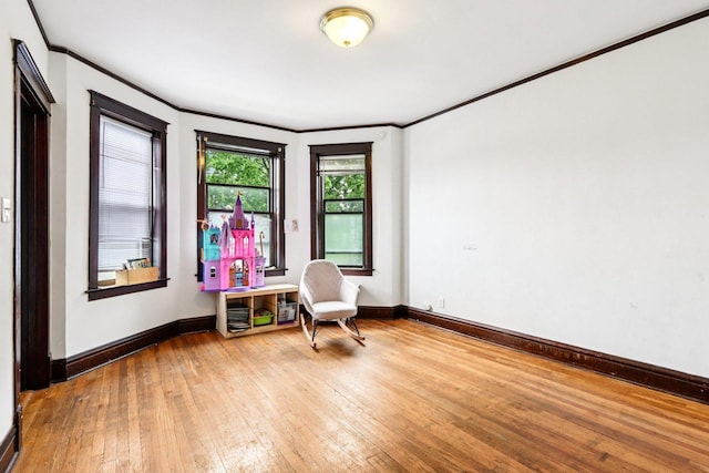 8548 S Manistee Ave, Chicago, IL 60617 - sitting room featuring crown molding, hardwood / wood-style floors, and baseboards