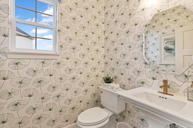12959 S Boulder Ln, Plainfield, IL 60585 - half bathroom with wallpapered walls, toilet, and a sink