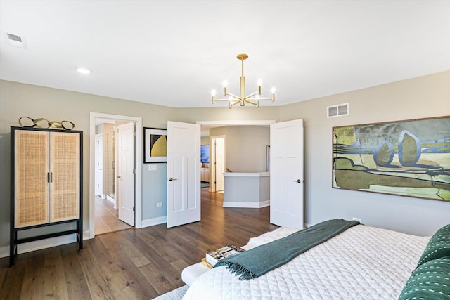12959 S Boulder Ln, Plainfield, IL 60585 - bedroom with a chandelier, dark wood-style flooring, baseboards, and recessed lighting