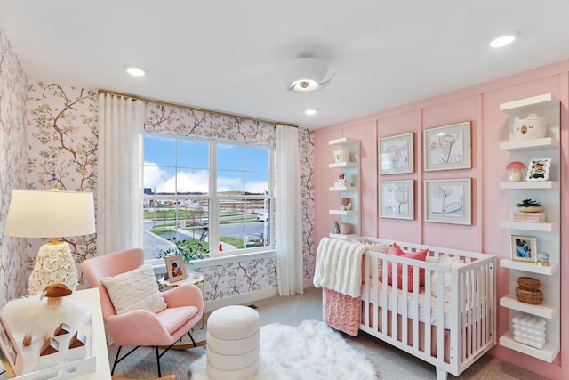 12959 S Boulder Ln, Plainfield, IL 60585 - bedroom with wallpapered walls, a nursery area, recessed lighting, carpet flooring, and baseboards