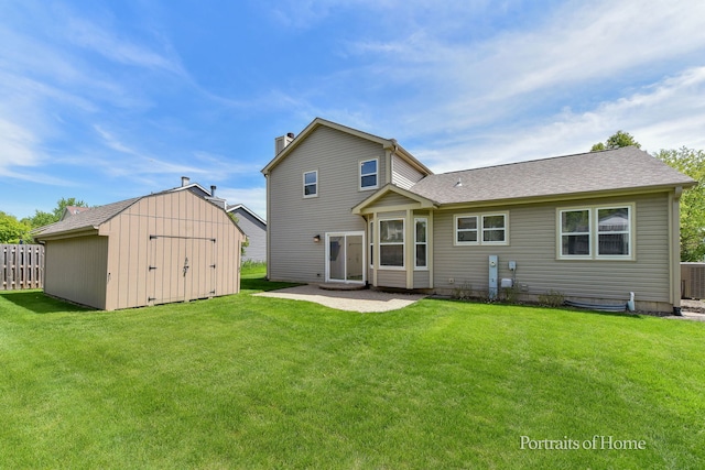 rear view of property with a storage unit, an outbuilding, a patio, cooling unit, and roof with shingles