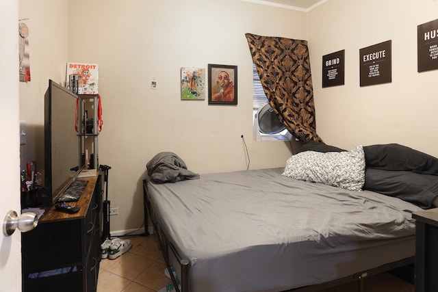 1002 N Drake Ave, Chicago, IL 60651 - bedroom with tile patterned flooring and crown molding