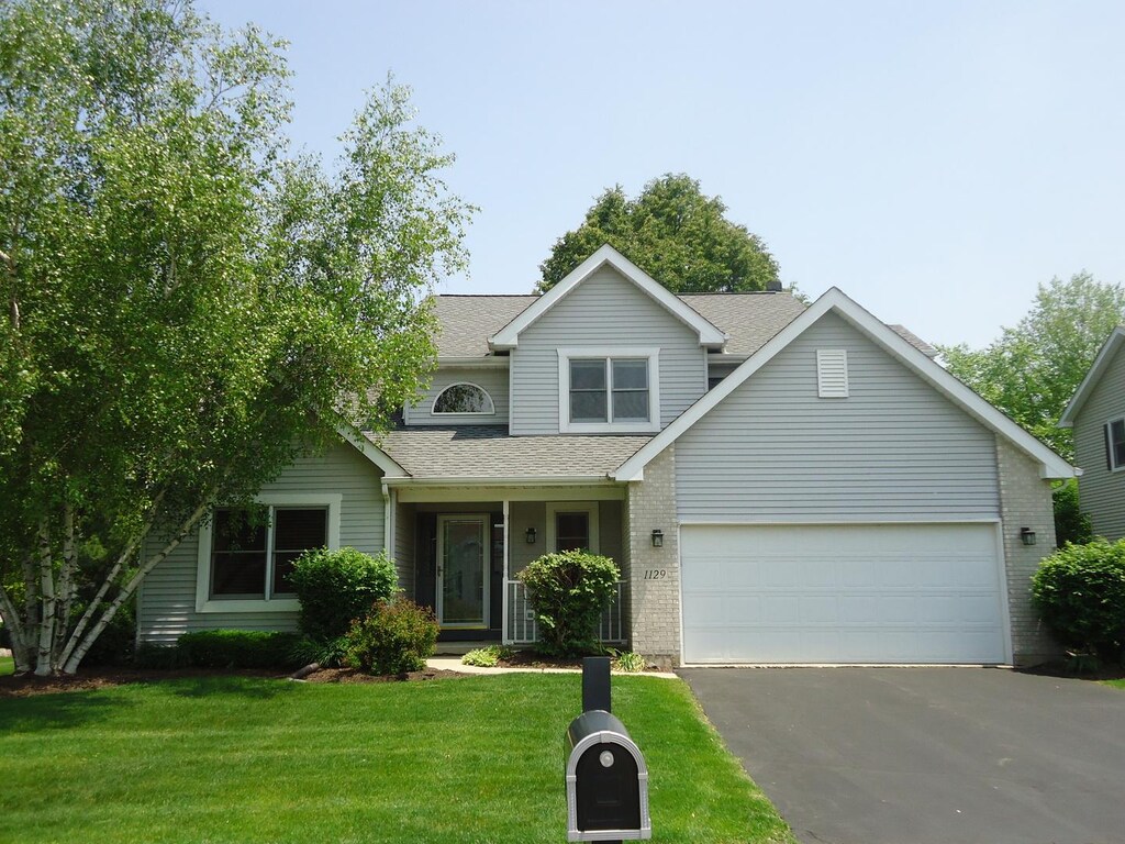 1129 Amber Ct, Woodstock, IL 60098 - photo 1