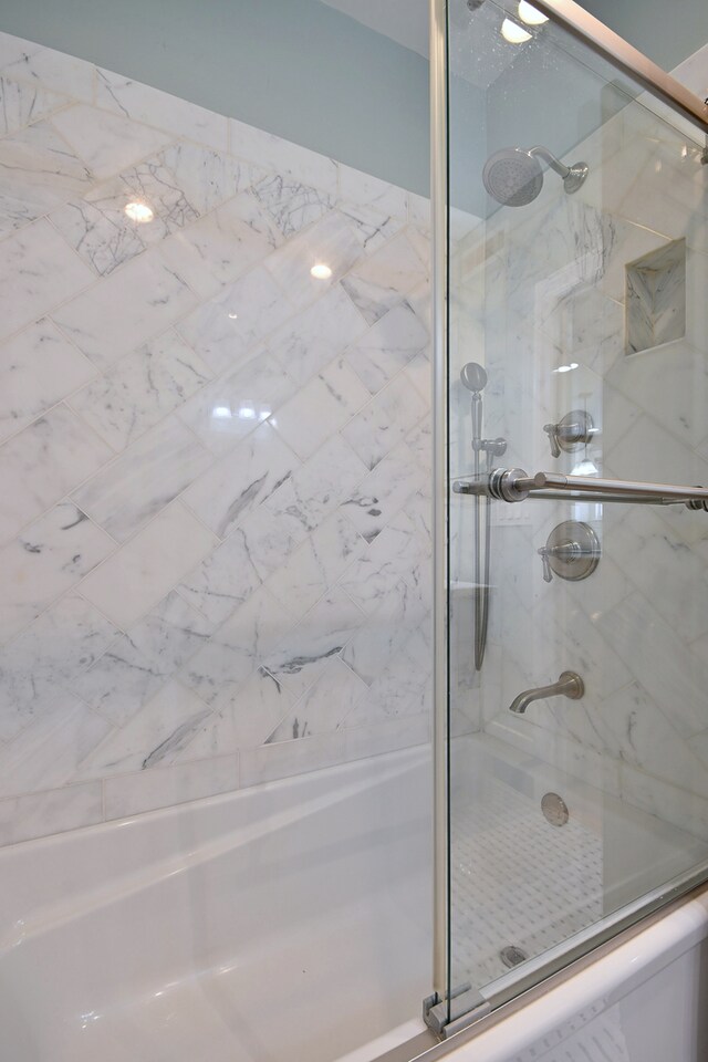 5813 W Eastwood Ave, Chicago, IL 60630 - bathroom featuring a marble finish shower