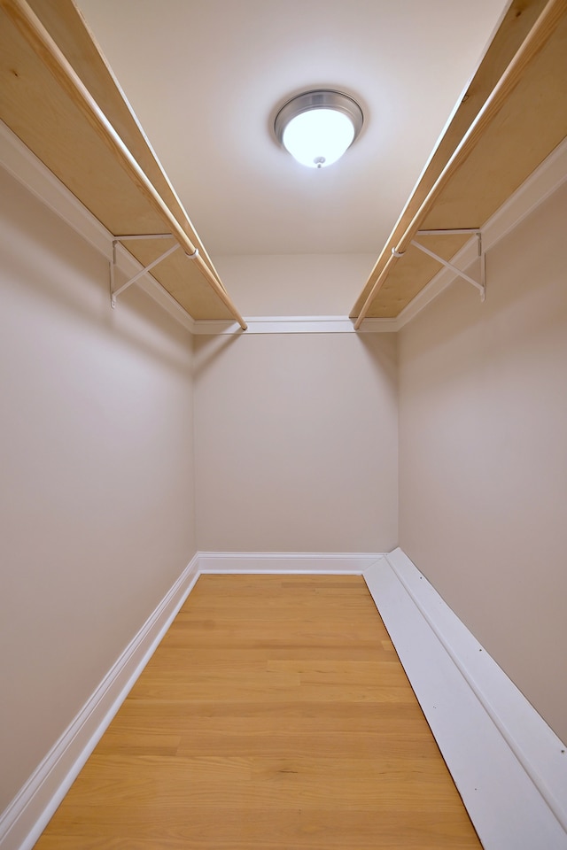 5813 W Eastwood Ave, Chicago, IL 60630 - spacious closet featuring light wood-style flooring