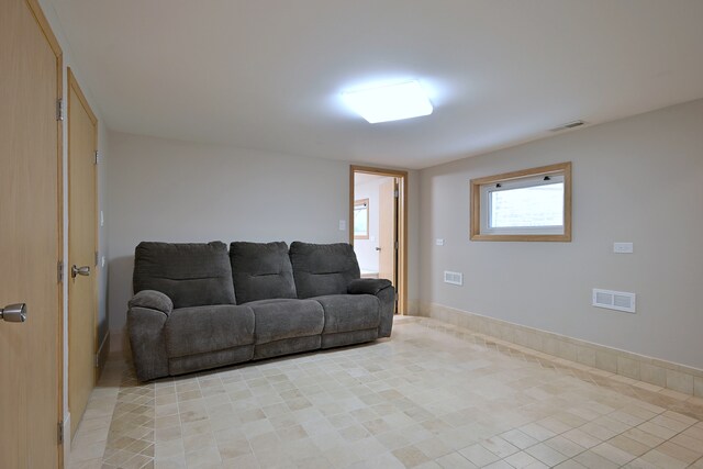 5813 W Eastwood Ave, Chicago, IL 60630 - living area with light tile patterned floors