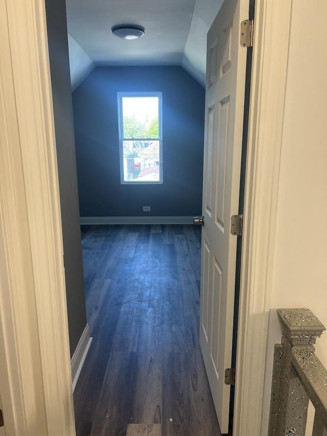 10642 S Calhoun Ave, Chicago, IL 60617 - additional living space featuring dark wood finished floors, vaulted ceiling, and baseboards