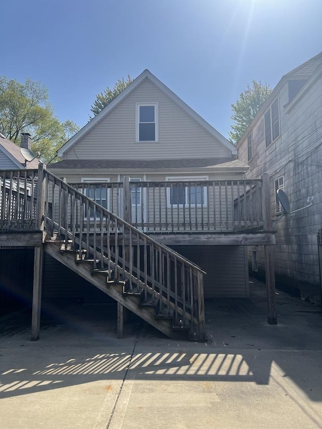 10642 S Calhoun Ave, Chicago, IL 60617 - back of property with stairs and a wooden deck