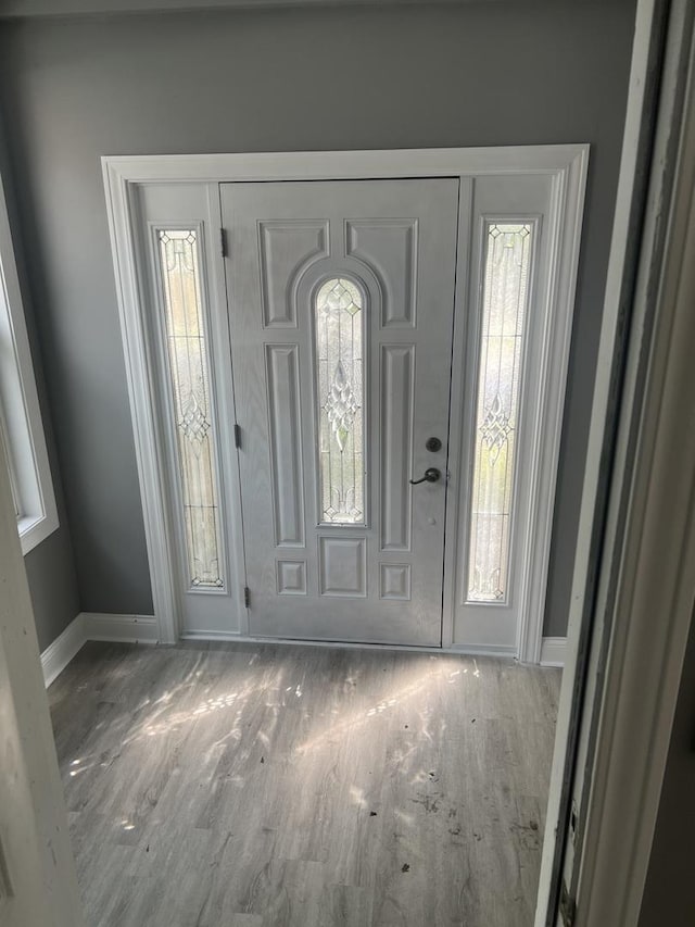 10642 S Calhoun Ave, Chicago, IL 60617 - foyer with wood finished floors and baseboards