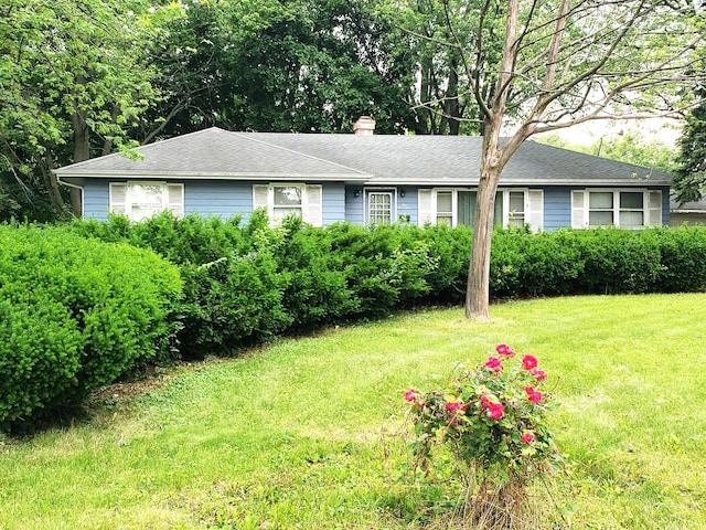 517 S Hebbard St, Joliet, IL 60433 - ranch-style home featuring a chimney and a front yard