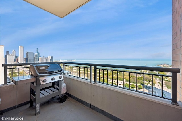 1160 S Michigan Ave Unit 3805, Chicago, IL 60605 - balcony with area for grilling, a water view, and a skyline view