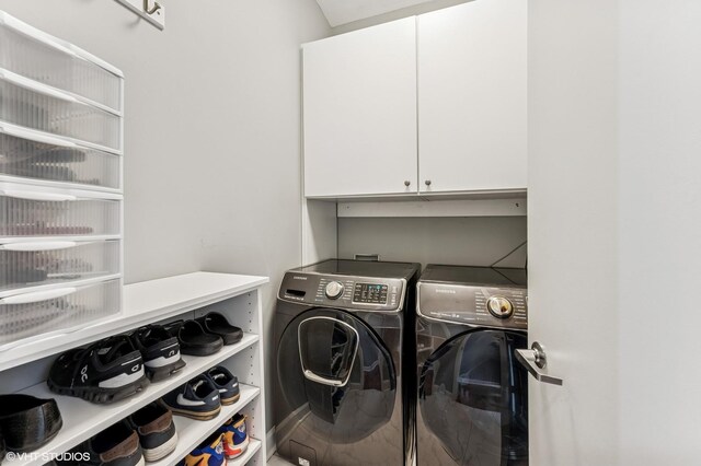 1160 S Michigan Ave Unit 3805, Chicago, IL 60605 - washroom featuring cabinet space and washer and dryer