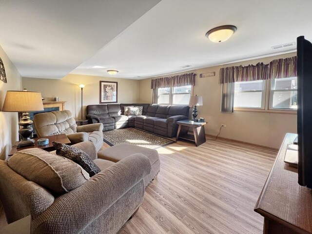 2919 193rd St, Lansing, IL 60438 - living room featuring light wood-style flooring and baseboards