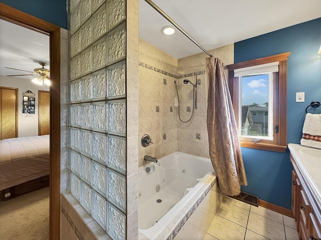 2919 193rd St, Lansing, IL 60438 - bathroom featuring a combined bath / shower with jetted tub, a ceiling fan, vanity, tile patterned floors, and baseboards