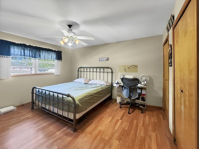 2919 193rd St, Lansing, IL 60438 - bedroom with light wood-type flooring, a closet, and ceiling fan