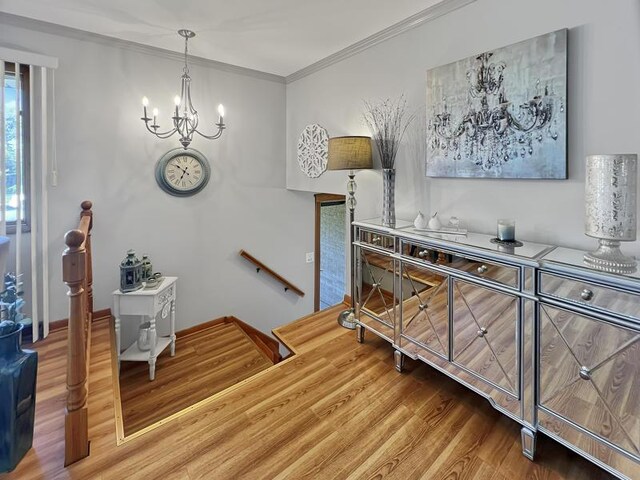 2919 193rd St, Lansing, IL 60438 - interior space featuring wood finished floors, crown molding, and a chandelier