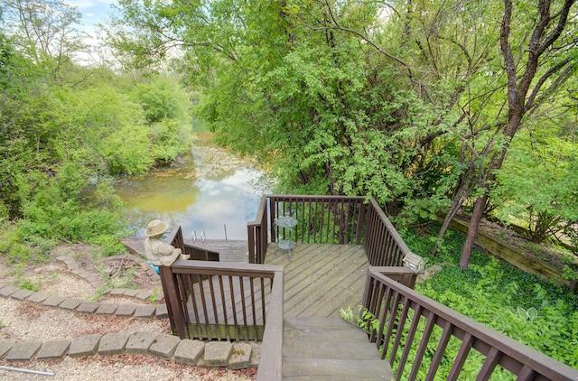 deck featuring a water view