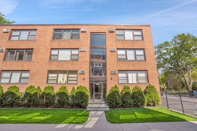 2907 W Summerdale Ave Unit D2, Chicago, IL 60625 - view of apartment building / complex featuring fence