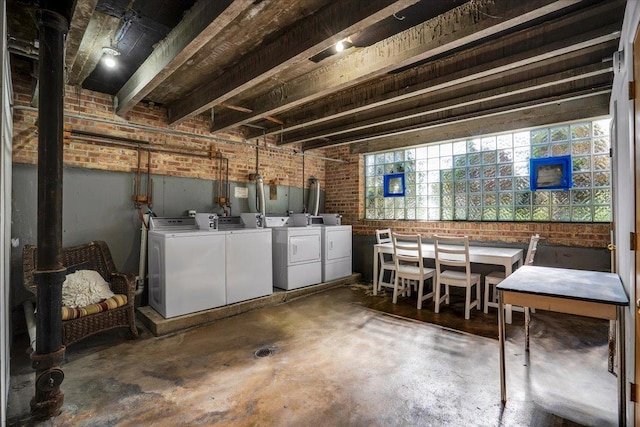 2907 W Summerdale Ave Unit D2, Chicago, IL 60625 - laundry area featuring brick wall and independent washer and dryer
