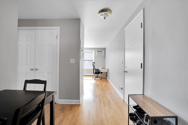 2907 W Summerdale Ave Unit D2, Chicago, IL 60625 - hall with a desk, light wood-type flooring, baseboards, and an AC wall unit