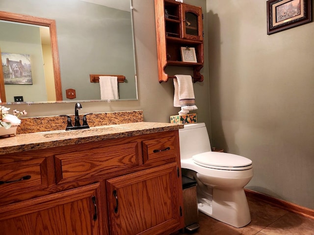 19629 Fiona Ave, Mokena, IL 60448 - half bathroom featuring toilet, vanity, tile patterned flooring, and baseboards