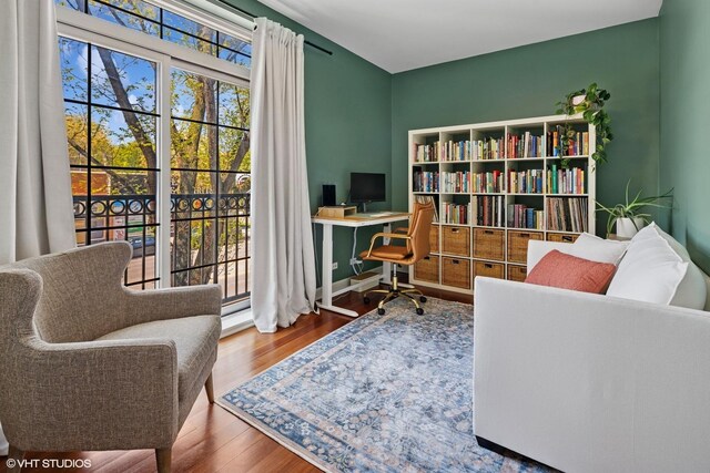 office space with wood finished floors