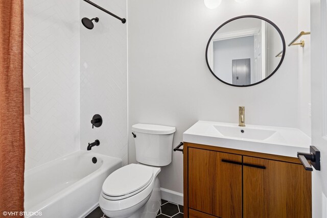 bathroom with toilet, shower / bathtub combination, vanity, baseboards, and tile patterned flooring
