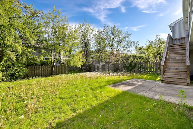 35 Buckingham Ln, Buffalo Grove, IL 60089 - view of yard featuring stairs, fence, and a patio