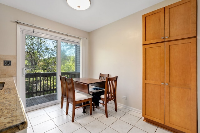 35 Buckingham Ln, Buffalo Grove, IL 60089 - dining area with baseboards and light tile patterned flooring