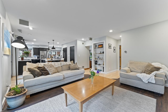 428 S Hillside Ave, Elmhurst, IL 60126 - living room with light wood-type flooring, recessed lighting, and baseboards