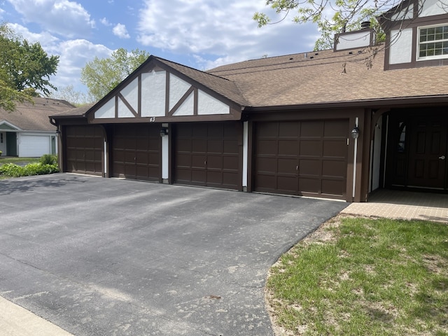garage with driveway
