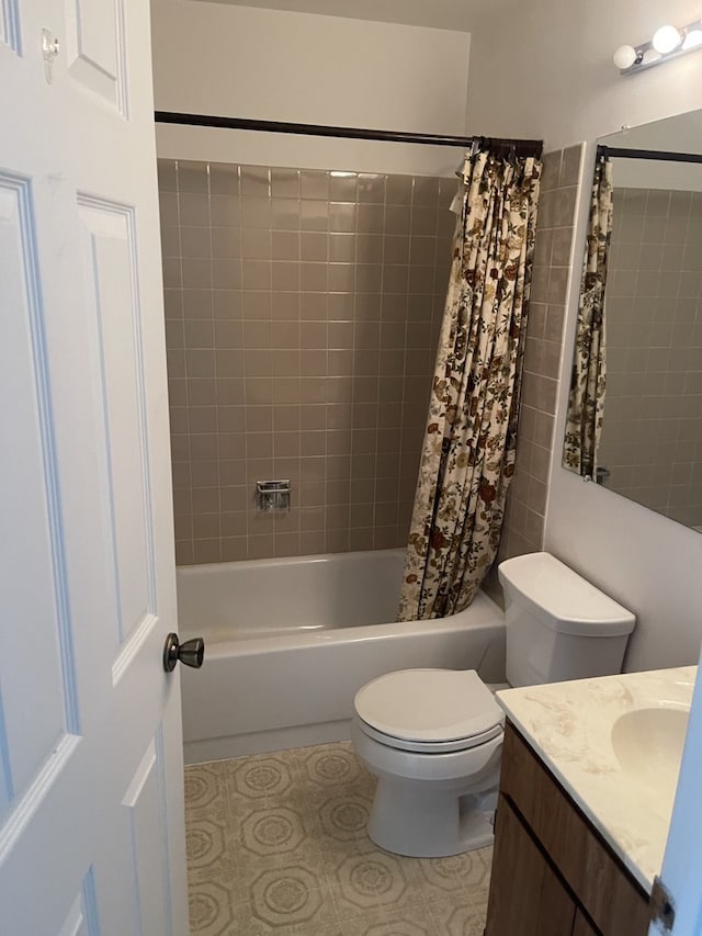 full bath featuring shower / tub combo, toilet, and vanity