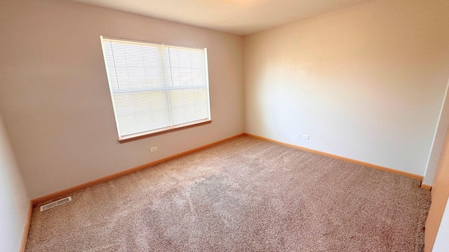 6409 Old Plank Blvd, Matteson, IL 60443 - carpeted spare room featuring baseboards