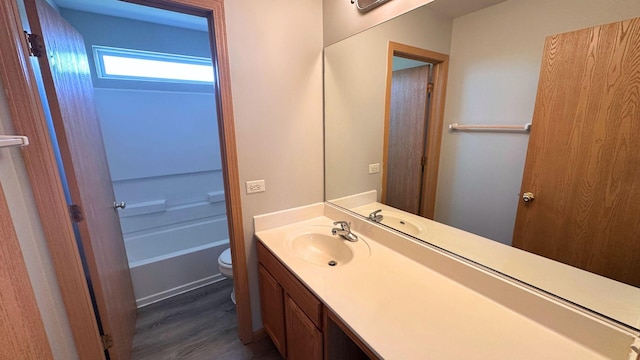 6409 Old Plank Blvd, Matteson, IL 60443 - full bath with toilet, wood finished floors, and vanity