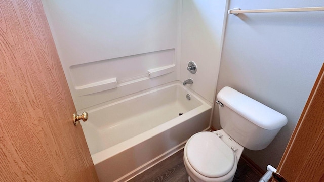 6409 Old Plank Blvd, Matteson, IL 60443 - bathroom featuring toilet, wood finished floors, and tub / shower combination