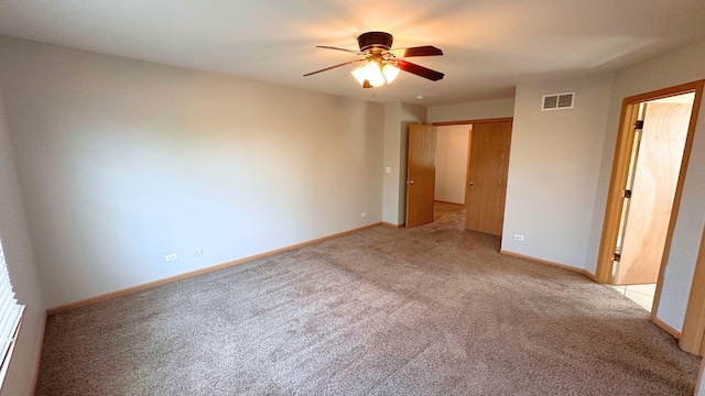 6409 Old Plank Blvd, Matteson, IL 60443 - unfurnished bedroom with light carpet, baseboards, and ceiling fan