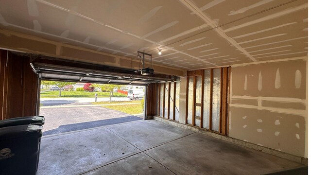 6409 Old Plank Blvd, Matteson, IL 60443 - garage with a garage door opener