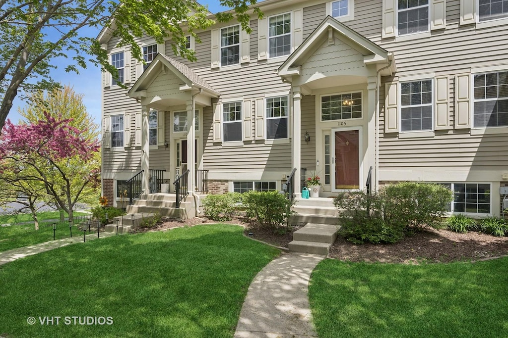1105 Manchester Cir Unit 1105, Grayslake, IL 60030 - view of front of home featuring a front lawn