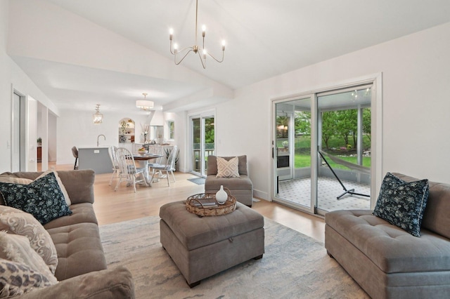 0N467 Cloos Ct, Winfield, IL 60190 - living area with a chandelier, light wood-type flooring, and lofted ceiling