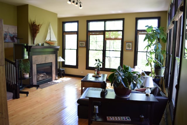 133 S Grove Ave, Elgin, IL 60120 - living area featuring wood finished floors and a tile fireplace