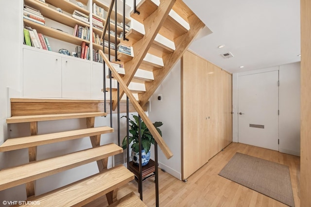 58 W Schiller St, Chicago, IL 60610 - staircase featuring wood finished floors