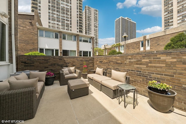 58 W Schiller St, Chicago, IL 60610 - view of patio / terrace featuring outdoor lounge area and fence