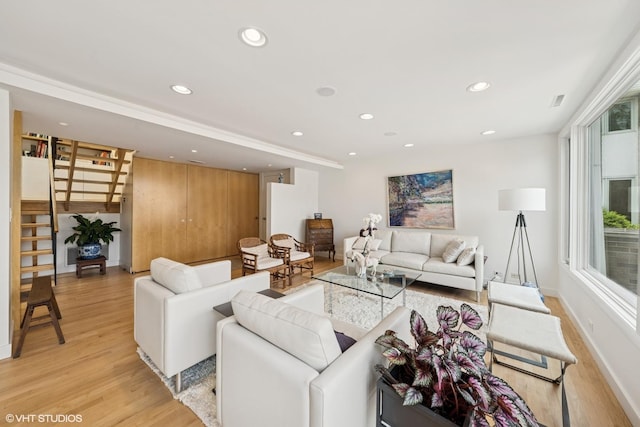 58 W Schiller St, Chicago, IL 60610 - living room featuring light wood finished floors, recessed lighting, stairway, and baseboards