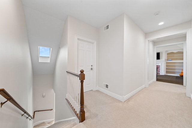 6590 Beech Ln, Libertyville, IL 60048 - hall featuring an upstairs landing, a skylight, carpet, and baseboards
