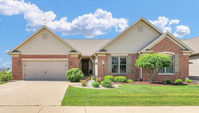 1601 Congressional Way, Champaign, IL 61822 - view of front of home featuring brick siding, a garage, concrete driveway, and a front lawn