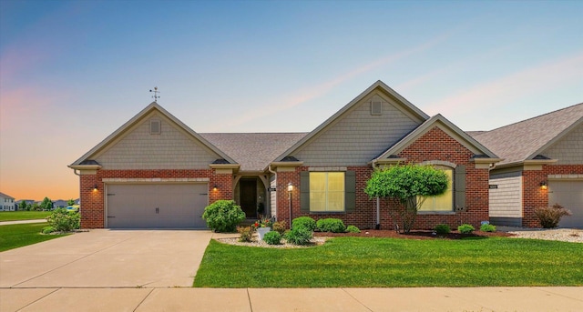 1601 Congressional Way, Champaign, IL 61822 - craftsman inspired home featuring brick siding, a lawn, driveway, a garage, and a shingled roof