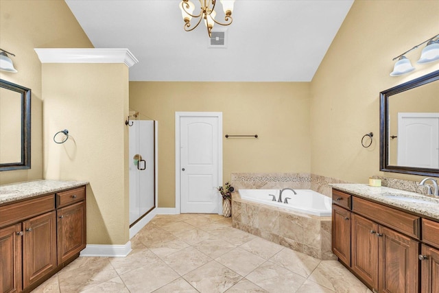 1601 Congressional Way, Champaign, IL 61822 - full bath featuring a chandelier, a bath, a shower stall, and two vanities