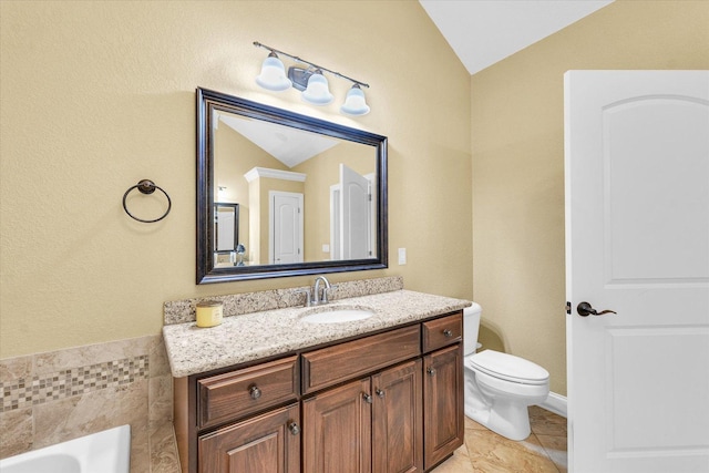 1601 Congressional Way, Champaign, IL 61822 - full bath with lofted ceiling, toilet, vanity, a tub, and tile patterned floors